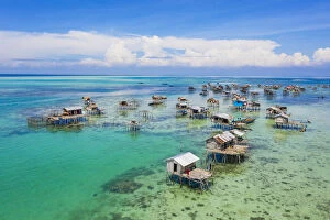 Images Dated 27th March 2020: atilt houses around Bodgaya Lagoon, Tun Sakaran Marine Park, Semporna, Sabah, Borneo