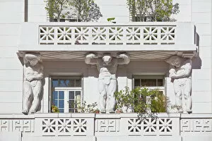 Atlas Collection: Atlas sculptures on a balcony of the Ateneo Grand Splendid Library's exterior facade, Recoleta