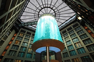 Atrium Prints: Atrium of the DomAquar e Hotel with a massive aquarium in the middle. Berlin, Germany