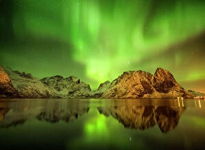 Images Dated 20th June 2023: Aurora Reflecting in Fjord, Hamnoy, Lofoten Islands, Norway