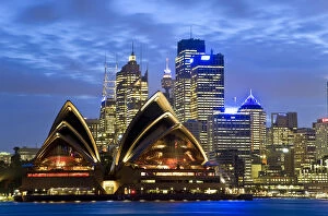 Images Dated 8th September 2009: Australia, Sydney, View across Sydney harbour to Sydney Opera House & skyline at dusk