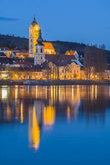 Austria, Lower Austria, Stein an der Donau, town view from the Danube River, dusk Austria, Lower Austria, Stein an der Donau, town view from the Danube River, dusk