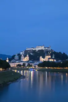 Austria, Salzburg, View of Salzach River and Hohensalzburg Castle above The Old City