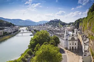 Austria, Salzburg, View of Salzach River and Hohensalzburg Castle above The Old City