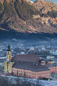 Austria, Tyrol, Innsbruck, elevated view of the Wilten Abbey Church, dawn, winter