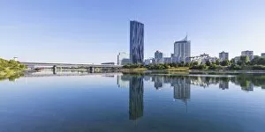 Images Dated 15th June 2017: Austria, Vienna, Donau City reflecting in New Danube River