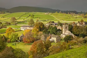 Yorkshire Dales Prints: Autumn colours surround the picturesque Yorkshire Dales village of Burnsall, Wharfedale