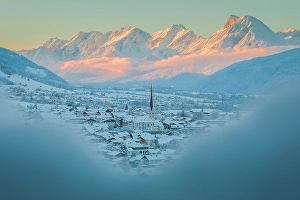 Snow Covered Prints: Axams with the Mieming mountain range in the background
