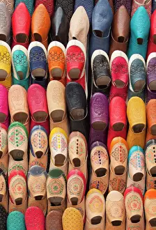 Shop Prints: Babouches colorful traditional Moroccan slippers on sale in a shop of the medina of Fez