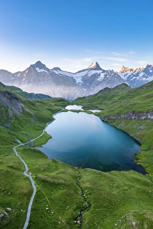 Grindelwald Prints: Bachalpsee lake during a summer sunrise. Grindelwald, Berner Oberland, Switzerland