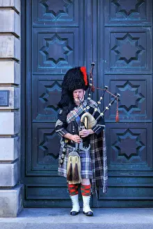 Royal Mile Prints: Bagpipe player on the Royal Mile, Edinburgh, Scotland, UK