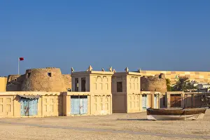 Arabian Gulf Prints: Bahrain, Manama, Arad Fort and traditional buildings with wind towers