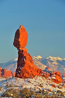 Eroded Prints: Balanced Rock with fresh snow, Arches National Park, Utah, USA
