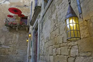 A balcony and lantern in Sarlat France