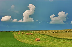 Bales Prints: Bales and stormy skies Holland, Manitoba, Canada