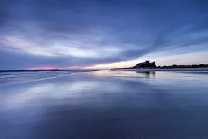Northumberland Prints: Bamburgh Castle and beach at dawn, Bamburgh, Northumberland, England