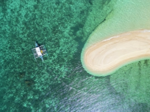The Philippines Prints: Banka boat on a Sandbar near the Gigantes Islands