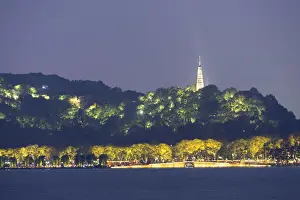 Baochu Pagoda and Bai Causeway on West Lake (UNESCO World Heritage Site) at dusk