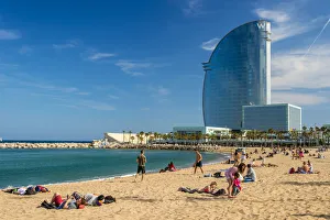 Barceloneta beach with W Barcelona Hotel in the background, Barcelona, Catalonia, Spain Barceloneta beach with W Barcelona Hotel in the background, Barcelona, Catalonia, Spain