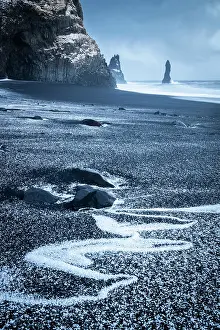 Columns Prints: Basaltic columns and Reynisdrangar​ at Reynisfjara beach during sunrise in winter