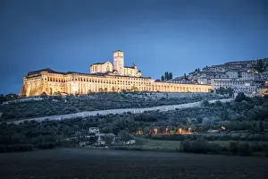 Blue Hour Prints: Basilica di San Francesco d Assisi illuminated in a spring evening, Umbria, Italy