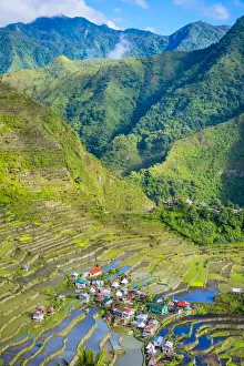 Batad village and UNESCO World Heritage rice terraces in early spring planting season