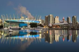 BC Place stadium and downtown skyline behind at sunrise, Vancouver, British Columbia