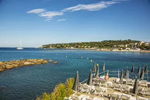 Beach in Antibes (Cap Antibes in background), Alpes-Maritimes, Provence-Alpes-Cote