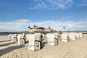Beach baskets in front of pier, Ahlbeck, Usedom island, Mecklenburg-Western Pomerania
