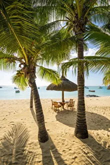 Riviere Noire Prints: The beach of the Beachcomber Paradis Hotel at sunset, Le Morne Brabant Peninsula