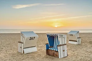Beach chairs at Hornum beach at sunrise, Sylt, Nordfriesland, Schleswig-Holstein, Germany