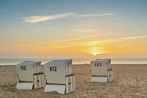 Images Dated 12th January 2023: Beach chairs at Hornum beach at sunrise, Sylt, Nordfriesland, Schleswig-Holstein, Germany
