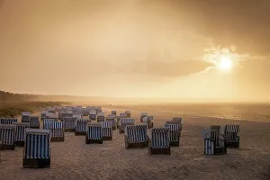 Beach Chairs Prints: Beach chairs with rain clouds with sunset in Prerow