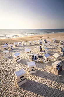 Beach chairs on the Red cliff in Kampen at sunset, Sylt, Schleswig-Holstein, Germany