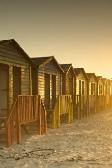 Beach huts on Muizenburg beach at dawn, Cape Town, Western Cape, South Africa