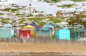 Low Tide Prints: Beach huts reflections at low tide, Tankerton beach, near Whitstable, Kent, England
