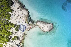 Famous Place Prints: Beach umbrellas on white sand beach by turquoise sea from above, Punta della Suina