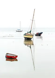 Essex Prints: Beached boats at the low tide at Leigh on Sea, Essex, England