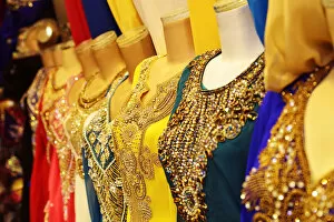 Images Dated 13th January 2015: Beaded womens dresses on sale at the Dubai Souk, Deira, Dubai, United Arab