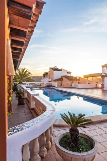 Swimming Pool Prints: Beautiful hotel terrace in Cala Fornells at sunrise, Mallorca, Balearic Islands, Spain