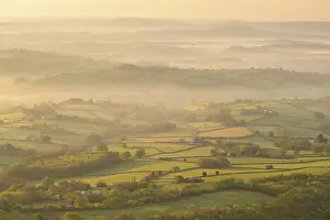 Beautiful morning sunlight on the rolling green fields of Bannau Brycheiniog, formerly known as the Brecon Beacons, Powys, Wales, UK. Spring (May) 2019