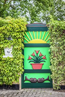 Zingst Prints: Beautiful wooden door with traditional motifs in Zingst