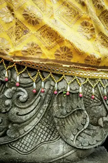Pura Prints: Bebali cloth covering a staue in a typical Balinese Hindu temple, Bali, Indonesia
