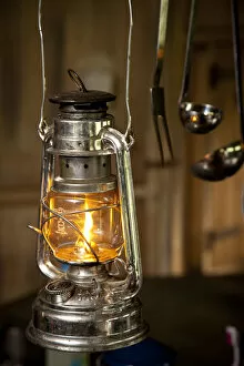 Bedfordshire, England. A paraffin lamp in a glamping holiday tent