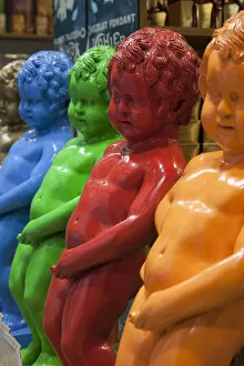 Images Dated 29th September 2010: Belgium, Brussels, Chocolate Shop Window Display of Mannekin Pis Statues