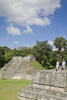 Plaza A Prints: Belize, Caracol ruins, Plaza A, Ladies standing on Structure A6 - Temple of the Wooden