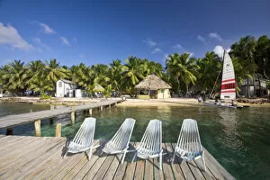 Caribbean Coast Gallery: Belize, Tobaco Caye, Chairs on jetty