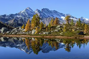 Bellagarda lake in autumn with Levanne on background (Orco valley, Gran Paradiso National Park, Piedmont, Italy, Italian alps)