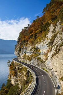 Bending road by lake Thun, Berner Oberland, Switzerland