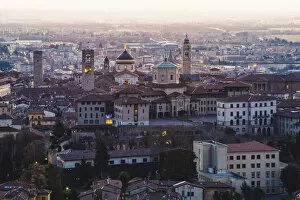 Images Dated 17th January 2017: Bergamo, Lombardy, Italy. High angle view over Upper Town (Citta Alta) at dusk